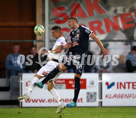 Fussball OEFB Cup. SAK gegen FAC Wien. Zoran Vukovic, (SAK), Christian Bubalovic  (FAC). Klagenfurt, am 24.9.2018.
Foto: Kuess
---
pressefotos, pressefotografie, kuess, qs, qspictures, sport, bild, bilder, bilddatenbank