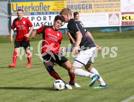 Fussball. Kaerntner Liga. Gmuend gegen SK Maria Saal. Domenik Steiner (Gmuend),  Arnel Mulahalilovic (Maria Saal). Gmuend, 6.10.2018.
Foto: Kuess 
---
pressefotos, pressefotografie, kuess, qs, qspictures, sport, bild, bilder, bilddatenbank