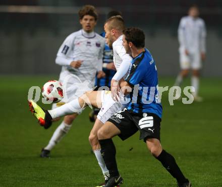 Fussball 2. Liga. SK Austria Klagenfurt gegen SKU Amstetten. Volkan Akyildiz, (Austria Klagenfurt),  Sascha Fahrngruber  (Amstetten). Klagenfurt, am 19.10.2018.
Foto: Kuess
---
pressefotos, pressefotografie, kuess, qs, qspictures, sport, bild, bilder, bilddatenbank