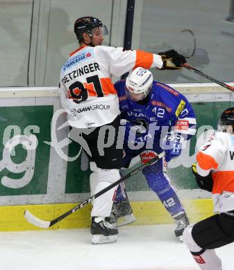 EBEL. Eishockey Bundesliga. EC VSV gegen Moser Medical Graz99ers. Benjamin Lanzinger,  (VSV), Oliver Setzinger (Graz). Villach, am 21.10.2018.
Foto: Kuess 


---
pressefotos, pressefotografie, kuess, qs, qspictures, sport, bild, bilder, bilddatenbank