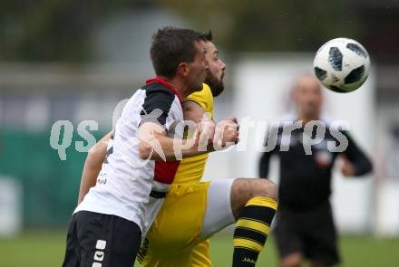 Fussball. Unterliga West. Nussdorf gegen Fuernitz.  Christian Berger (Nussdorf), Elvis Sahinovic  (Fuernitz). Nussdorf, 27.10.2018.
Foto: Kuess
---
pressefotos, pressefotografie, kuess, qs, qspictures, sport, bild, bilder, bilddatenbank