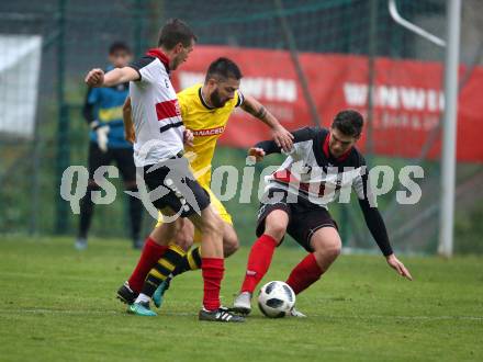 Fussball. Unterliga West. Nussdorf gegen Fuernitz. Christian Berger, David Oberhuber (Nussdorf), Elvis Sahinovic  (Fuernitz). Nussdorf, 27.10.2018.
Foto: Kuess
---
pressefotos, pressefotografie, kuess, qs, qspictures, sport, bild, bilder, bilddatenbank