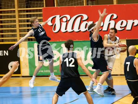 Basketball 2. Bundesliga. Grunddurchgang 8. Runde. Woerthersee Piraten gegen BBC Nord Dragonz Eisenstadt.  Jan-Arne Apschner (Woerthersee Piraten), Christian Lehrner, Ognjen Drljaca (BBC Nord Dragonz). Klagenfurt, am 24.11.2018.
Foto: Kuess
---
pressefotos, pressefotografie, kuess, qs, qspictures, sport, bild, bilder, bilddatenbank