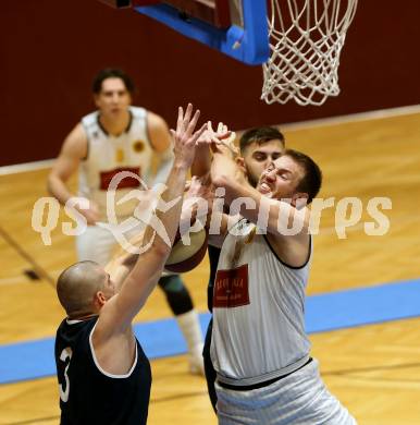 Basketball 2. Bundesliga. Grunddurchgang 8. Runde. Woerthersee Piraten gegen BBC Nord Dragonz Eisenstadt.  Maximilian Kunovjanek (Woerthersee Piraten), Attila Hegedues,  (BBC Nord Dragonz). Klagenfurt, am 24.11.2018.
Foto: Kuess
---
pressefotos, pressefotografie, kuess, qs, qspictures, sport, bild, bilder, bilddatenbank