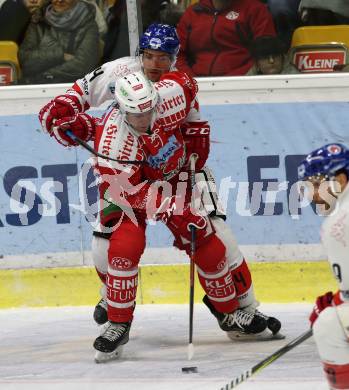 EBEL. Eishockey Bundesliga. KAC gegen	HC TWK Innsbruck (Die Haie).  Nicholas Eric Petersen,  (KAC), Sacha Guimond (Innsbruck). Klagenfurt, am 2.12.2018.
Foto: Kuess

---
pressefotos, pressefotografie, kuess, qs, qspictures, sport, bild, bilder, bilddatenbank