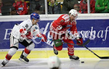 EBEL. Eishockey Bundesliga. KAC gegen	HC TWK Innsbruck (Die Haie).  Siim Liivik, (KAC),  Mario Lamoureux  (Innsbruck). Klagenfurt, am 2.12.2018.
Foto: Kuess

---
pressefotos, pressefotografie, kuess, qs, qspictures, sport, bild, bilder, bilddatenbank