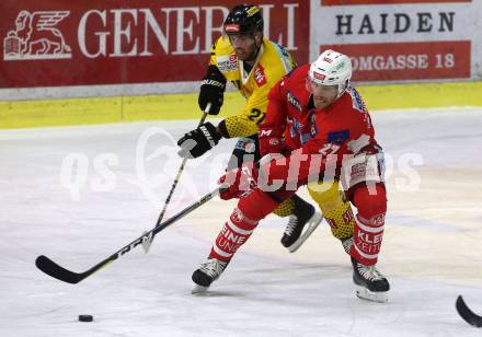 EBEL. Eishockey Bundesliga. KAC gegen	spusu Vienna Capitals. Thomas Hundertpfund, (KAC), Holzapfel Riley (Vienna Capitals). Klagenfurt, am 23.12.2018.
Foto: Kuess

---
pressefotos, pressefotografie, kuess, qs, qspictures, sport, bild, bilder, bilddatenbank