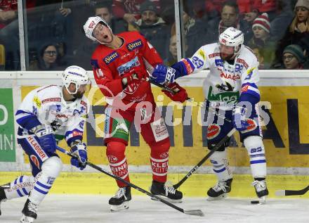 EBEL. Eishockey Bundesliga. KAC gegen	VSV. Adam Comrie,  (KAC), Markus Schlacher (VSV). Klagenfurt, am 28.12.2018.
Foto: Kuess

---
pressefotos, pressefotografie, kuess, qs, qspictures, sport, bild, bilder, bilddatenbank