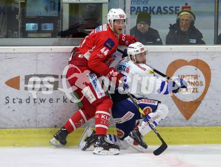 EBEL. Eishockey Bundesliga. KAC gegen	VSV. Adam Comrie, (KAC), Bernd Wolf  (VSV). Klagenfurt, am 28.12.2018.
Foto: Kuess

---
pressefotos, pressefotografie, kuess, qs, qspictures, sport, bild, bilder, bilddatenbank