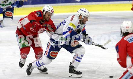 EBEL. Eishockey Bundesliga. KAC gegen	VSV. Marcel Witting,  (KAC),   Jerry Pollastrone (VSV). Klagenfurt, am 28.12.2018.
Foto: Kuess

---
pressefotos, pressefotografie, kuess, qs, qspictures, sport, bild, bilder, bilddatenbank