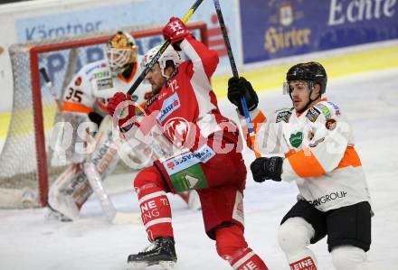 EBEL. Eishockey Bundesliga. KAC gegen	Moser Medical Graz99ers. Liivik Siim (KAC), Caito Matthew (Graz). Klagenfurt, am 4.1.2019.
Foto: Kuess

---
pressefotos, pressefotografie, kuess, qs, qspictures, sport, bild, bilder, bilddatenbank