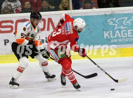 EBEL. Eishockey Bundesliga. KAC gegen	Moser Medical Graz99ers. Fischer David Joseph (KAC), Hamilton Curtis (Graz). Klagenfurt, am 4.1.2019.
Foto: Kuess

---
pressefotos, pressefotografie, kuess, qs, qspictures, sport, bild, bilder, bilddatenbank