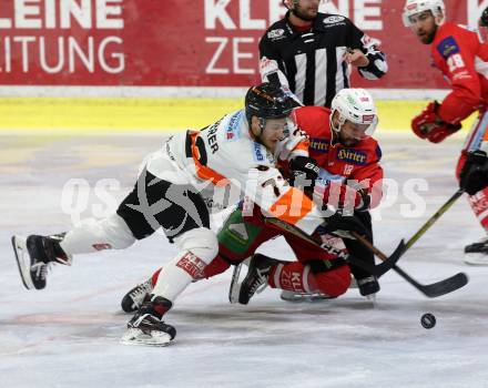 EBEL. Eishockey Bundesliga. KAC gegen	Moser Medical Graz99ers.  Thomas Koch (KAC), Moderer Kevin (Graz). Klagenfurt, am 4.1.2019.
Foto: Kuess

---
pressefotos, pressefotografie, kuess, qs, qspictures, sport, bild, bilder, bilddatenbank