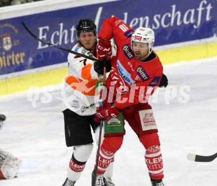 EBEL. Eishockey Bundesliga. KAC gegen	Moser Medical Graz99ers. Kozek Andrew Jacob (KAC), Weihager Peter Robin (Graz). Klagenfurt, am 4.1.2019.
Foto: Kuess

---
pressefotos, pressefotografie, kuess, qs, qspictures, sport, bild, bilder, bilddatenbank