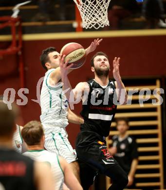 Basketball 2. Bundesliga. Grunddurchgang 14. Runde. KOS Celovec gegen   	BK Mattersburg Rocks. Toman Feinig (KOS), Tobias Winkler (BK Mattersburg Rocks). Klagenfurt, am 13.1.2019.
Foto: Kuess
---
pressefotos, pressefotografie, kuess, qs, qspictures, sport, bild, bilder, bilddatenbank