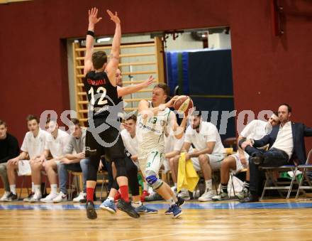 Basketball 2. Bundesliga. Grunddurchgang 14. Runde. KOS Celovec gegen   	BK Mattersburg Rocks. Erik Kralj (KOS), Philipp Germ, Corey Hallett (BK Mattersburg Rocks). Klagenfurt, am 13.1.2019.
Foto: Kuess
---
pressefotos, pressefotografie, kuess, qs, qspictures, sport, bild, bilder, bilddatenbank