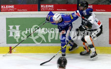 EBEL. Eishockey Bundesliga. EC VSV gegen Dornbirn Bulldogs.  MacGregor Sharp,  (VSV), Olivier Magnan (Dornbirn). Villach, am 1.2.2019.
Foto: Kuess 


---
pressefotos, pressefotografie, kuess, qs, qspictures, sport, bild, bilder, bilddatenbank
