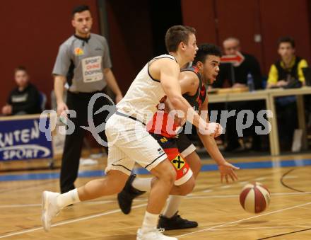 Basketball 2. Bundesliga. Grunddurchgang 17. Runde. Woerthersee Piraten gegen UBC St. Poelten.  Elvis Keric (Woerthersee Piraten), Nico Kaltenbrunner (St. Poelten). Klagenfurt, am 2.2.2019.
Foto: Kuess
---
pressefotos, pressefotografie, kuess, qs, qspictures, sport, bild, bilder, bilddatenbank