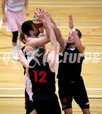 Basketball 2. Bundesliga. Grunddurchgang 15. Runde. Raiders Villach gegen Mistelbach Mustangs.  Antonio Boban (Villach), Stefan Obermann, Vladimir Sismilich  (Mistelbach Mustangs). Klagenfurt, am 3.3.2019.
Foto: Kuess
---
pressefotos, pressefotografie, kuess, qs, qspictures, sport, bild, bilder, bilddatenbank