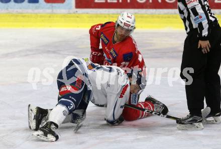 EBEL. Eishockey Bundesliga. KAC gegen	Fehervar AV 19. Thomas HUndertpfund,  (KAC), Aron Sandor Reisz (Fehervar AV 19). Klagenfurt, am 10.3.2019.
Foto: Kuess

---
pressefotos, pressefotografie, kuess, qs, qspictures, sport, bild, bilder, bilddatenbank