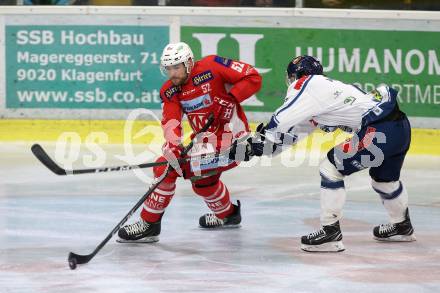 EBEL. Eishockey Bundesliga. KAC gegen	Fehervar AV 19. Christoph Duller,  (KAC),  Eric Wayne Meland (Fehervar AV 19). Klagenfurt, am 10.3.2019.
Foto: Kuess

---
pressefotos, pressefotografie, kuess, qs, qspictures, sport, bild, bilder, bilddatenbank