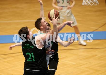 Basketball 2. Bundesliga. Play Down 1. Runde. KOS Celovec gegen   	Deutsch Wagram Alligators. Jan Razdevsek,  (KOS), Lukas Geyrhofer (Deutsch Wagram). Klagenfurt, am 16.3.2019.
Foto: Kuess
---
pressefotos, pressefotografie, kuess, qs, qspictures, sport, bild, bilder, bilddatenbank