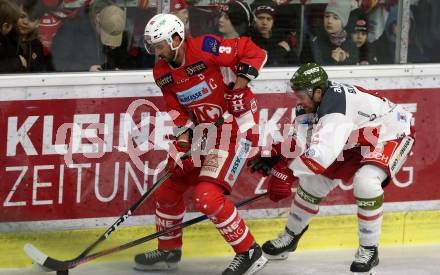 EBEL. Eishockey Bundesliga. KAC gegen	HCB Suedtirol Alperia. David Joseph Fischer,  (KAC), Michael Blunden (Bozen). Klagenfurt, am 22.3.2019.
Foto: Kuess

---
pressefotos, pressefotografie, kuess, qs, qspictures, sport, bild, bilder, bilddatenbank