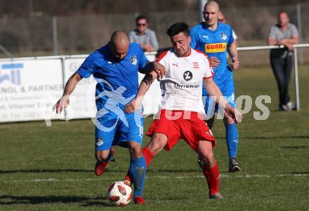 Fussball Kaerntner Liga. Woelfnitz gegen Bleiburg. Michael Schneider,  (Woelfnitz),  Dejan Geric (Bleiburg). Woelfnitz, am 23.3.2019.
Foto: Kuess
---
pressefotos, pressefotografie, kuess, qs, qspictures, sport, bild, bilder, bilddatenbank