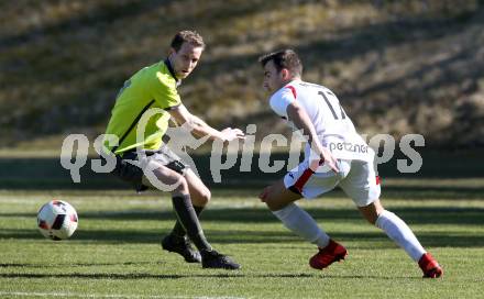 Fussball. Kaerntner Liga. ATUS Ferlach gegen Lind. Michael Brandner,  (Ferlach), Lukas Gritschacher  (Lind). Ferlach, am 30.3.2019.
Foto: Kuess
---
pressefotos, pressefotografie, kuess, qs, qspictures, sport, bild, bilder, bilddatenbank