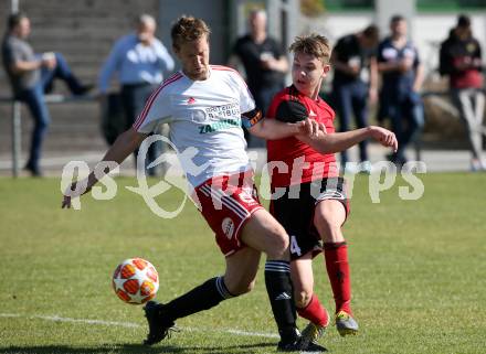 Fussball Kaerntner Liga. St. Jakob/Ros. gegen St. Michael/Bl.. Florian Schaller (St.Jakob), Samo Bernhard Olip  (St.Michael). St. Jakob, am 30.3.2019.
Foto: Kuess
---
pressefotos, pressefotografie, kuess, qs, qspictures, sport, bild, bilder, bilddatenbank