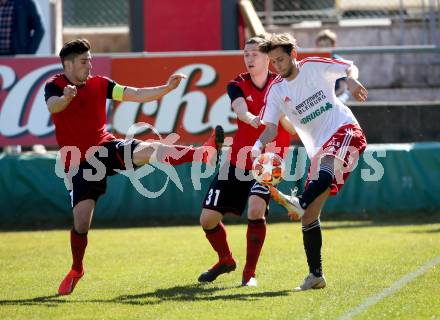 Fussball Kaerntner Liga. St. Jakob/Ros. gegen St. Michael/Bl..  Manuel Alexander Schuettelkopf,  Alexander Stroj (St.Jakob), Arnold Gross (St.Michael). St. Jakob, am 30.3.2019.
Foto: Kuess
---
pressefotos, pressefotografie, kuess, qs, qspictures, sport, bild, bilder, bilddatenbank