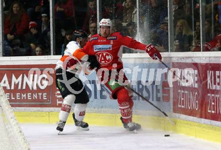EBEL. Eishockey Bundesliga. KAC gegen	Moser Medical Graz99ers. Nicholas Eric Petersen,  (KAC), Karl Johansson (Graz). Klagenfurt, am 5.4.2019.
Foto: Kuess

---
pressefotos, pressefotografie, kuess, qs, qspictures, sport, bild, bilder, bilddatenbank