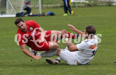 Fussball 1. Klasse A. Doelsach gegen Hermagor. Fabian Kashofer,  (Doelsach), Gabriel Wassermann (Hermagor). Doelsach, am 6.4.2019.
Foto: Kuess
---
pressefotos, pressefotografie, kuess, qs, qspictures, sport, bild, bilder, bilddatenbank