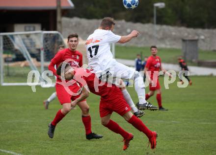 Fussball 1. Klasse A. Doelsach gegen Hermagor. Marcel Lassnig,  (Doelsach),  Marin Brkovic (Hermagor). Doelsach, am 6.4.2019.
Foto: Kuess
---
pressefotos, pressefotografie, kuess, qs, qspictures, sport, bild, bilder, bilddatenbank