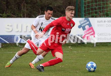 Fussball 1. Klasse A. Doelsach gegen Hermagor. Akim Stahl, (Doelsach),  Jan Logar  (Hermagor). Doelsach, am 6.4.2019.
Foto: Kuess
---
pressefotos, pressefotografie, kuess, qs, qspictures, sport, bild, bilder, bilddatenbank