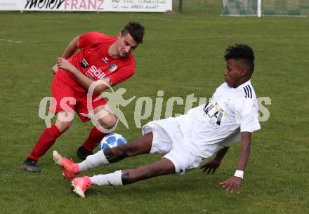 Fussball 1. Klasse A. Doelsach gegen Hermagor. Abdiwali Ali, (Doelsach),  Christian Zankl  (Hermagor). Doelsach, am 6.4.2019.
Foto: Kuess
---
pressefotos, pressefotografie, kuess, qs, qspictures, sport, bild, bilder, bilddatenbank