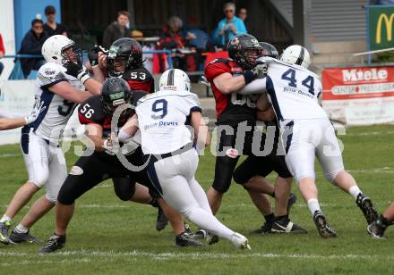 American Football. AFL Division I. Carinthian Lions	gegen Cineplexx Blue Devils. Daniel Zivkovic, Dennis Kamber, Thomas Hohenwarter (Carinthian Lions), Sandro Gossweiler, Alexander Ertl (Blue Devils). Klagenfurt, am 7.4.2019.
Foto: Kuess 
---
pressefotos, pressefotografie, kuess, qs, qspictures, sport, bild, bilder, bilddatenbank