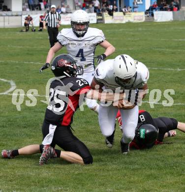 American Football. AFL Division I. Carinthian Lions	gegen Cineplexx Blue Devils. Markus Baurecht,  (Carinthian Lions), Thomas Patschg (Blue Devils). Klagenfurt, am 7.4.2019.
Foto: Kuess 
---
pressefotos, pressefotografie, kuess, qs, qspictures, sport, bild, bilder, bilddatenbank