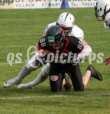 American Football. AFL Division I. Carinthian Lions	gegen Cineplexx Blue Devils. Oliver Rescher,  (Carinthian Lions), Sandro Gossweiler (Blue Devils). Klagenfurt, am 7.4.2019.
Foto: Kuess 
---
pressefotos, pressefotografie, kuess, qs, qspictures, sport, bild, bilder, bilddatenbank
