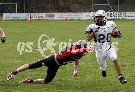 American Football. AFL Division I. Carinthian Lions	gegen Cineplexx Blue Devils. Nikolaus Rabitsch,  (Carinthian Lions), Fabio DiRosa (Blue Devils). Klagenfurt, am 7.4.2019.
Foto: Kuess 
---
pressefotos, pressefotografie, kuess, qs, qspictures, sport, bild, bilder, bilddatenbank