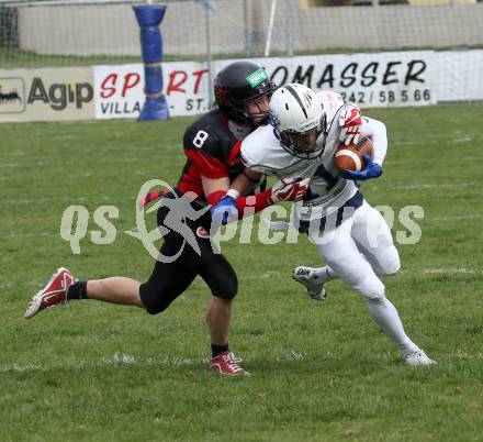 American Football. AFL Division I. Carinthian Lions	gegen Cineplexx Blue Devils. Nikolaus Rabitsch,  (Carinthian Lions), Dario Weder (Blue Devils). Klagenfurt, am 7.4.2019.
Foto: Kuess 
---
pressefotos, pressefotografie, kuess, qs, qspictures, sport, bild, bilder, bilddatenbank