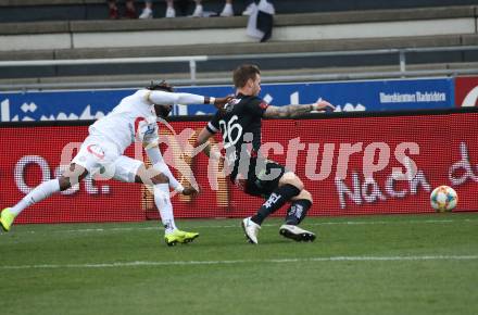 Fussball tipico Bundesliga. RZ Pellets WAC gegen FK Austria Wien. Michael Sollbauer,  (WAC), Osagie Bright Edomwonyi (Wien). Wolfsberg, am 14.4.2019.
Foto: Kuess

---
pressefotos, pressefotografie, kuess, qs, qspictures, sport, bild, bilder, bilddatenbank
