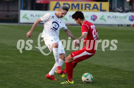 Fussball Kaerntner Liga. SAK gegen ATUS Ferlach.  Thomas Riedl, (SAK),   Martin Sustersic (Ferlach). Klagenfurt, am 18.4.2019.
Foto: Kuess
---
pressefotos, pressefotografie, kuess, qs, qspictures, sport, bild, bilder, bilddatenbank