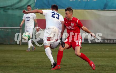 Fussball Kaerntner Liga. SAK gegen ATUS Ferlach.  Armin Kukavica, (SAK),   Erwin Bajric (Ferlach). Klagenfurt, am 18.4.2019.
Foto: Kuess
---
pressefotos, pressefotografie, kuess, qs, qspictures, sport, bild, bilder, bilddatenbank