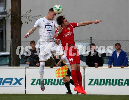 Fussball Kaerntner Liga. SAK gegen ATUS Ferlach.  Zoran Vukovic,  (SAK),   Mateo Brisevac (Ferlach). Klagenfurt, am 18.4.2019.
Foto: Kuess
---
pressefotos, pressefotografie, kuess, qs, qspictures, sport, bild, bilder, bilddatenbank