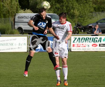 Fussball Kaerntner Liga. Bleiburg gegen St. Jakob im Rosental. Adnan Besic, (Bleiburg), Harald Ottowitz  (St. Jakob). Bleiburg, am 25.5.2019.
Foto: Kuess
---
pressefotos, pressefotografie, kuess, qs, qspictures, sport, bild, bilder, bilddatenbank