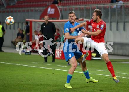 Fussball Laenderspiel. Europameisterschaft Qualifikation. Oesterreich gegen Slowenien. Andreas Ulmer,  (Oesterreich), Domen Crnigoj (Slowenien). Klagenfurt, am 7.6.2019.
Foto: Kuess
---
pressefotos, pressefotografie, kuess, qs, qspictures, sport, bild, bilder, bilddatenbank