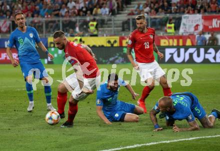 Fussball Laenderspiel. Europameisterschaft Qualifikation. Oesterreich gegen Slowenien. Marko Arnautovic, Guido Burgstaller,  (Oesterreich), Denis Popovic, Miha Mevlja, Aljaz Struna (Slowenien). Klagenfurt, am 7.6.2019.
Foto: Kuess
---
pressefotos, pressefotografie, kuess, qs, qspictures, sport, bild, bilder, bilddatenbank