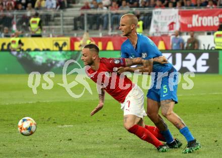 Fussball Laenderspiel. Europameisterschaft Qualifikation. Oesterreich gegen Slowenien. Marko Arnautovic,  (Oesterreich), Aljaz Struna (Slowenien). Klagenfurt, am 7.6.2019.
Foto: Kuess
---
pressefotos, pressefotografie, kuess, qs, qspictures, sport, bild, bilder, bilddatenbank
