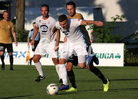 Fussball Kaerntner Liga. SAK gegen Koettmannsdorf. Amer Krcic,  (SAK),  Christopher Sallinger (Koettmannsdorf). Klagenfurt, am 9.8.2019.
Foto: Kuess
www.qspictures.net
---
pressefotos, pressefotografie, kuess, qs, qspictures, sport, bild, bilder, bilddatenbank